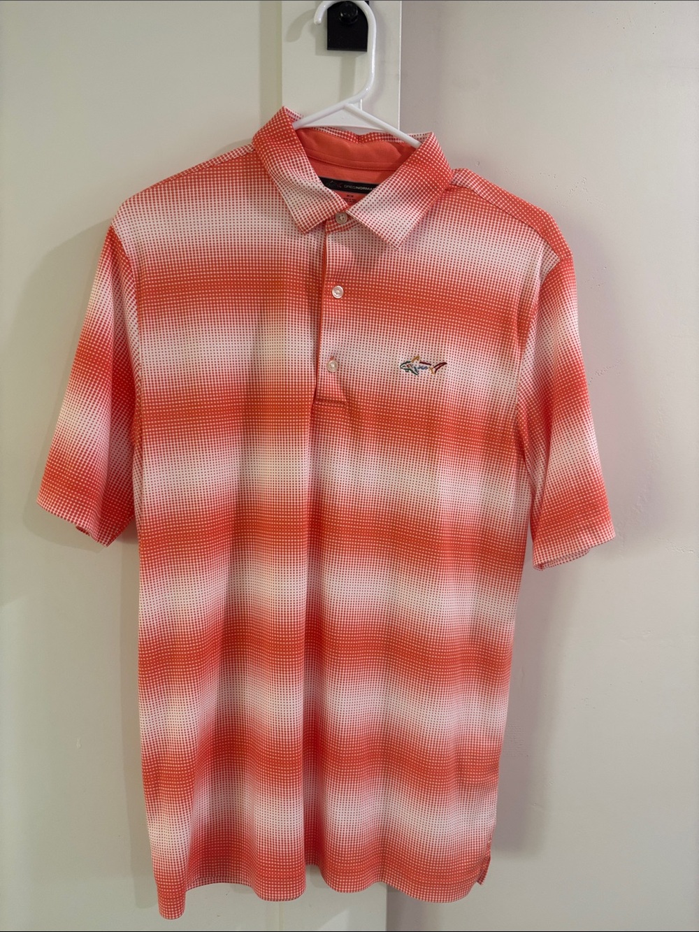 Greg Norman golf polo in orange/white gradient. Poly/cotton. Me'sn M. Like new.